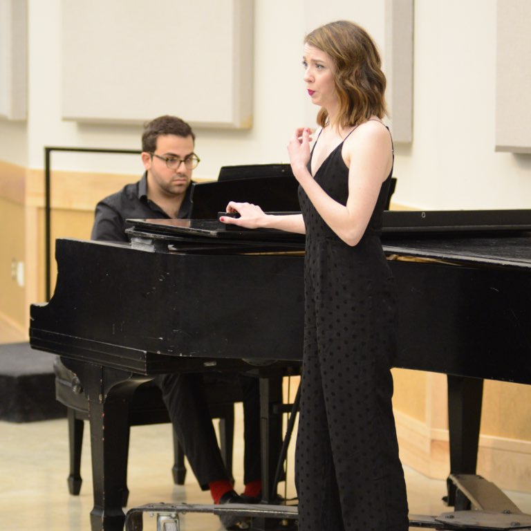 Vocal student performing for class.